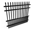 Black metal fence with pointed top bars on a white background