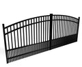Black metal smooth top aluminum double driveway gate with puppy pickets on a white background