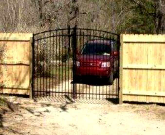 Rainbow arch top aluminum gate installed. Decorative double driveway gate.